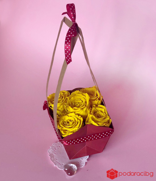 Basket with yellow everlasting roses