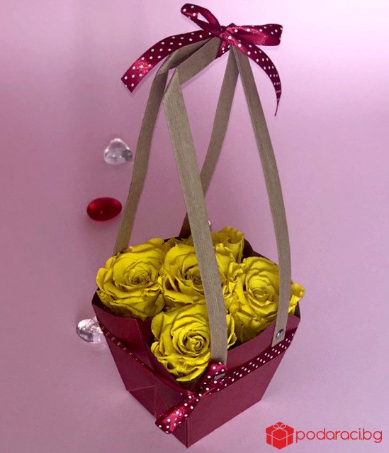 Basket with yellow everlasting roses