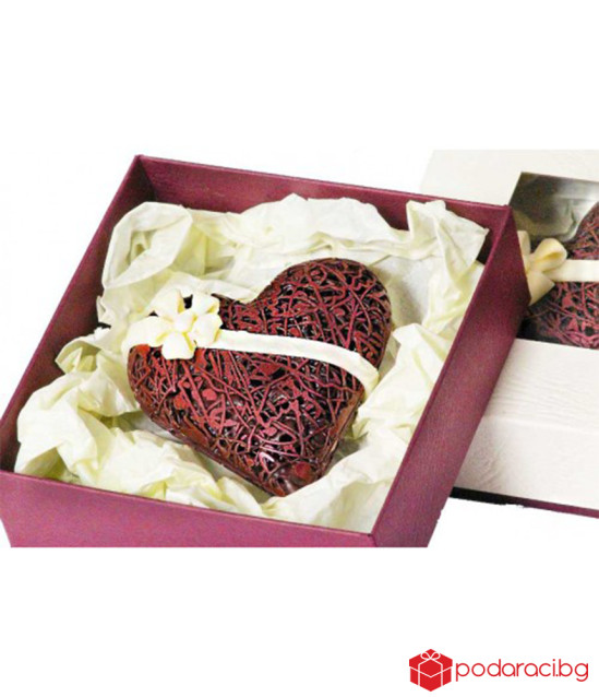 A box with a lace chocolate heart
