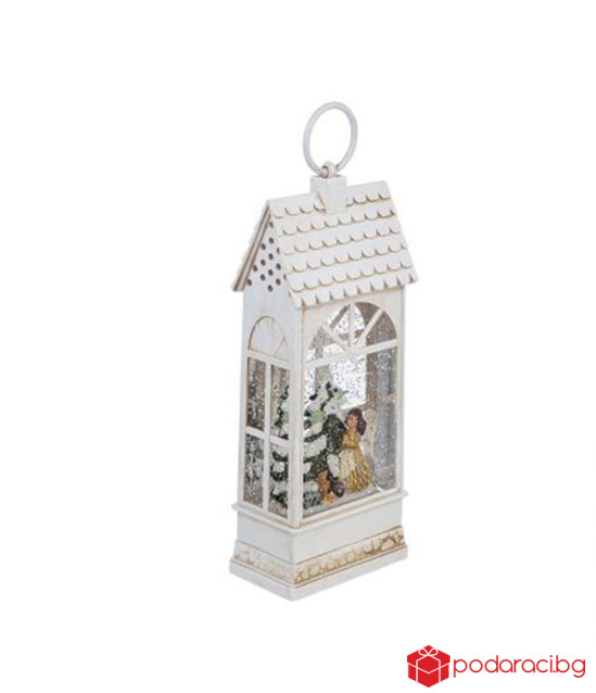 Светеща къща с ангел