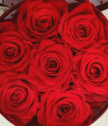 Кръгла кутия с  7 червени рози